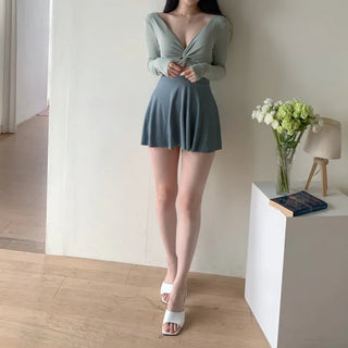 twist pastel long sleeve ballet core one-piece swimsuit