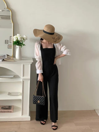 backless sleeveless nasi strap black long wide jumpsuit