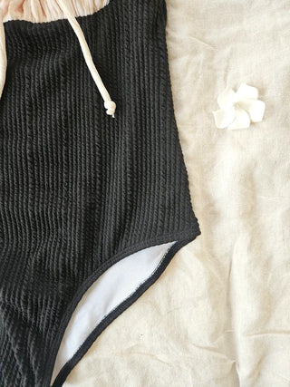 Ivory shirring ribbon frill ruffle color block black ribbed one-piece swimsuit