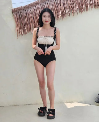 Ivory shirring ribbon frill ruffle color block black ribbed one-piece swimsuit