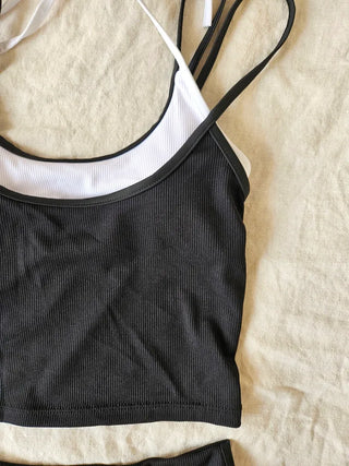 Black and white ribbed crop top bra top dolphin pants two-piece sporty bikini surfing activity water park swimsuit