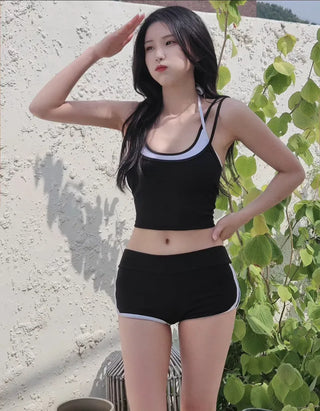 Black and white ribbed crop top bra top dolphin pants two-piece sporty bikini surfing activity water park swimsuit