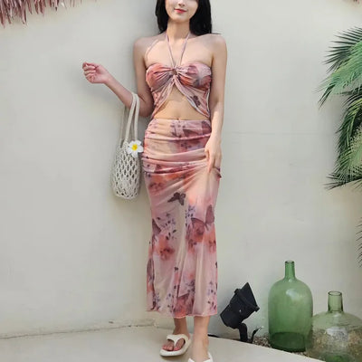Butterfly bikini see-through piece swimsuit set with long skirt and cover-up for a delicate beach look and halter neck swimsuit.