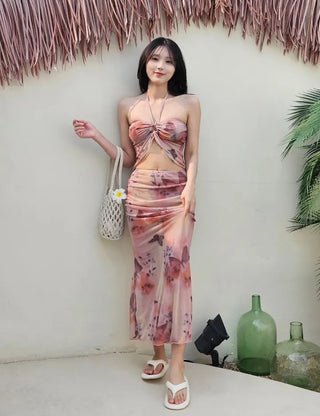 Butterfly bikini see-through piece swimsuit set with long skirt and cover-up for a delicate beach look and halter neck swimsuit.
