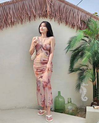 Butterfly bikini see-through piece swimsuit set with long skirt and cover-up for a delicate beach look and halter neck swimsuit.