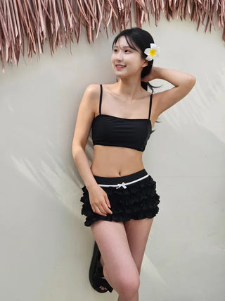 Black frill piece bikini set with crop top cover-up skirt and ribbon strap swimsuit