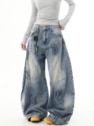 distressed graffiti jeans