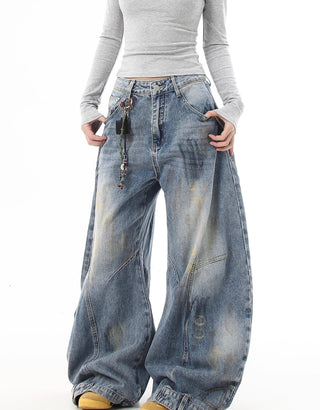 distressed graffiti jeans
