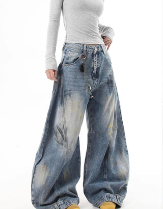 distressed graffiti jeans