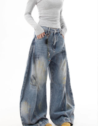 distressed graffiti jeans
