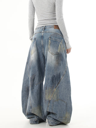 distressed graffiti jeans