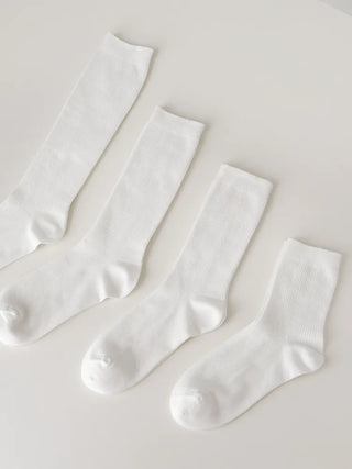 Firm, non-slip, stretchy long knee socks in