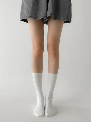 Firm, non-slip, stretchy long knee socks in