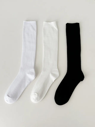 Firm, non-slip, stretchy long knee socks in