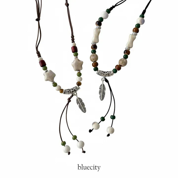 Feather n'Pipe Ceramic Knot Long Necklace