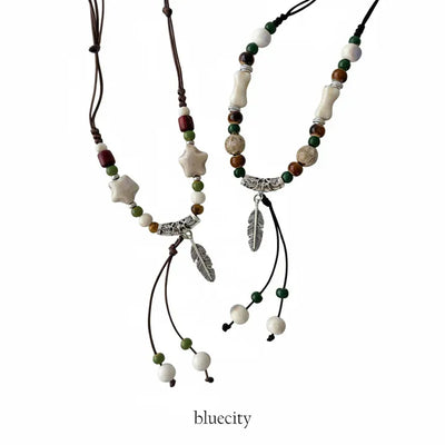 Feather n'Pipe Ceramic Knot Long Necklace