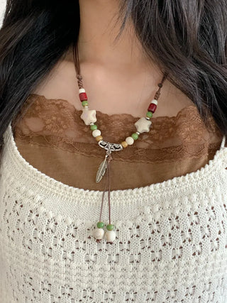 Feather n'Pipe Ceramic Knot Long Necklace