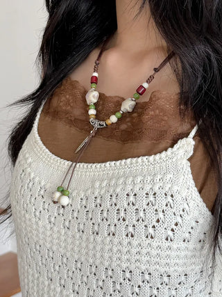 Feather n'Pipe Ceramic Knot Long Necklace