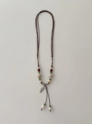 Feather n'Pipe Ceramic Knot Long Necklace