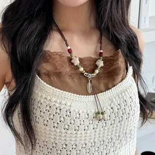 Feather n'Pipe Ceramic Knot Long Necklace