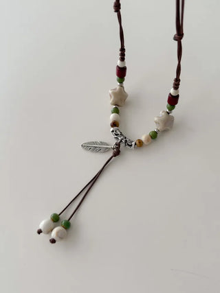 Feather n'Pipe Ceramic Knot Long Necklace