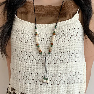 Feather n'Pipe Ceramic Knot Long Necklace