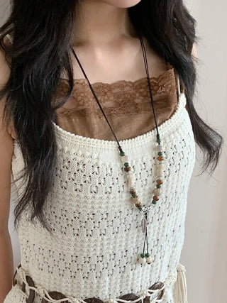 Feather n'Pipe Ceramic Knot Long Necklace