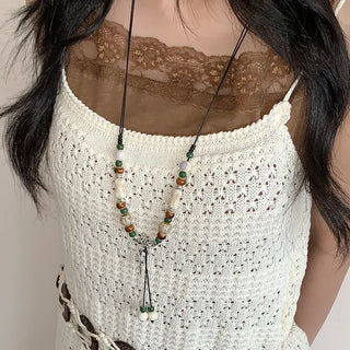 Feather n'Pipe Ceramic Knot Long Necklace