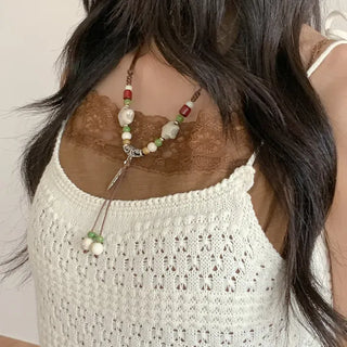 Feather n'Pipe Ceramic Knot Long Necklace