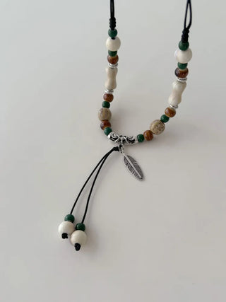 Feather n'Pipe Ceramic Knot Long Necklace