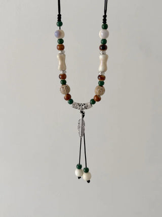 Feather n'Pipe Ceramic Knot Long Necklace