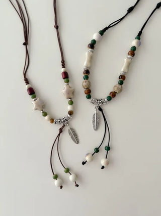 Feather n'Pipe Ceramic Knot Long Necklace
