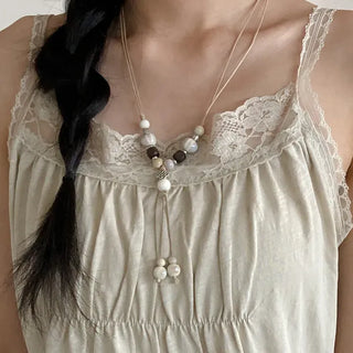 Mono Ivory Wood Ceramic Knot Long Drop Necklace