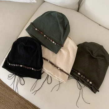 Brit Staud Strap String Beanie Hat