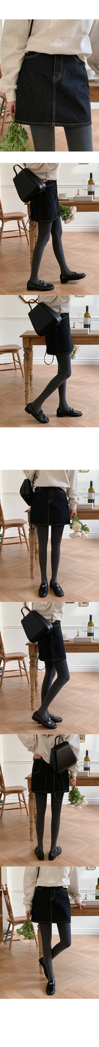 Low denim black mini skirt