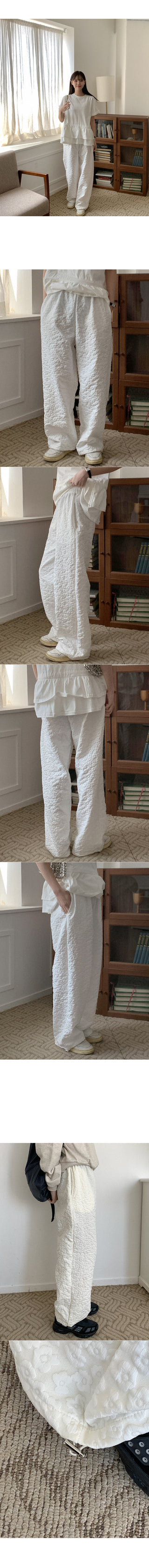 Flower embossed elastic waist pants
