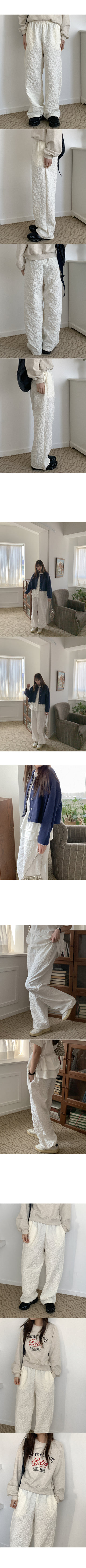Flower embossed elastic waist pants