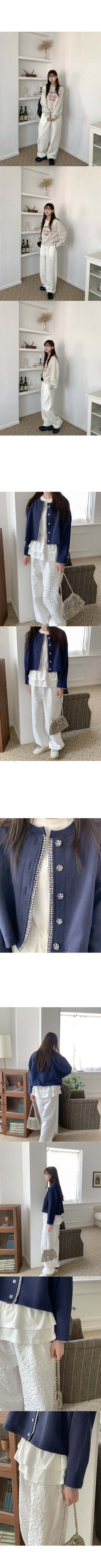 Flower embossed elastic waist pants