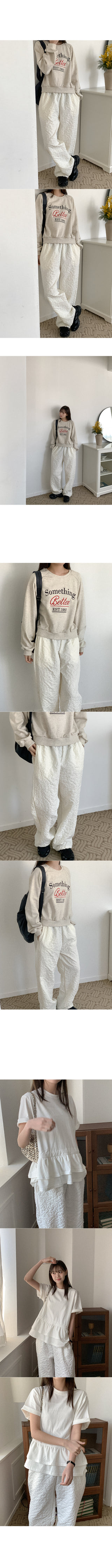Flower embossed elastic waist pants