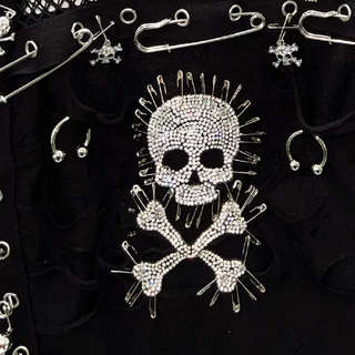 Crewneck hollow out skull beaded metal chain cut out top