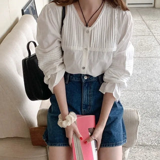Pleated long-sleeved blouse