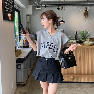 Pleated denim mini skirt