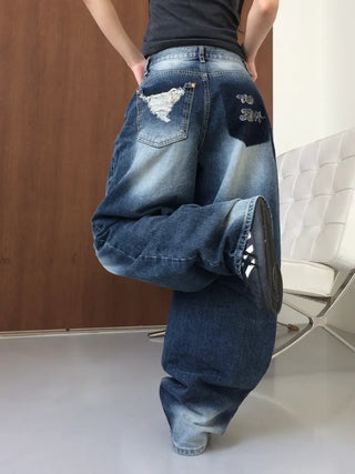 Lao back pocket embroidered washed denim pants