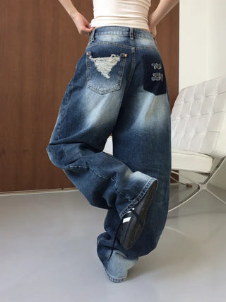 Lao back pocket embroidered washed denim pants