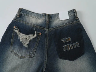 Lao back pocket embroidered washed denim pants