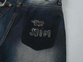 Lao back pocket embroidered washed denim pants