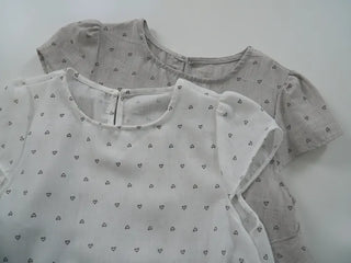 Heart diagonal asymmetrical frill blouse