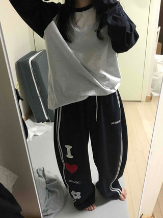 Kitsch Embossed Track Long Pants