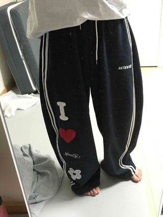 Kitsch Embossed Track Long Pants
