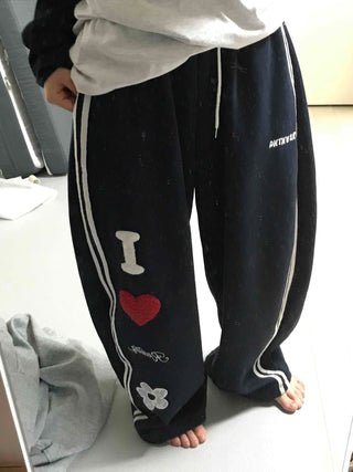 Kitsch Embossed Track Long Pants